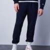 Champion -  pantalone lungo uomo in cotone garzato
